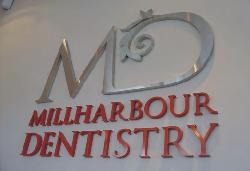 Dentistry sign with built-up letters.